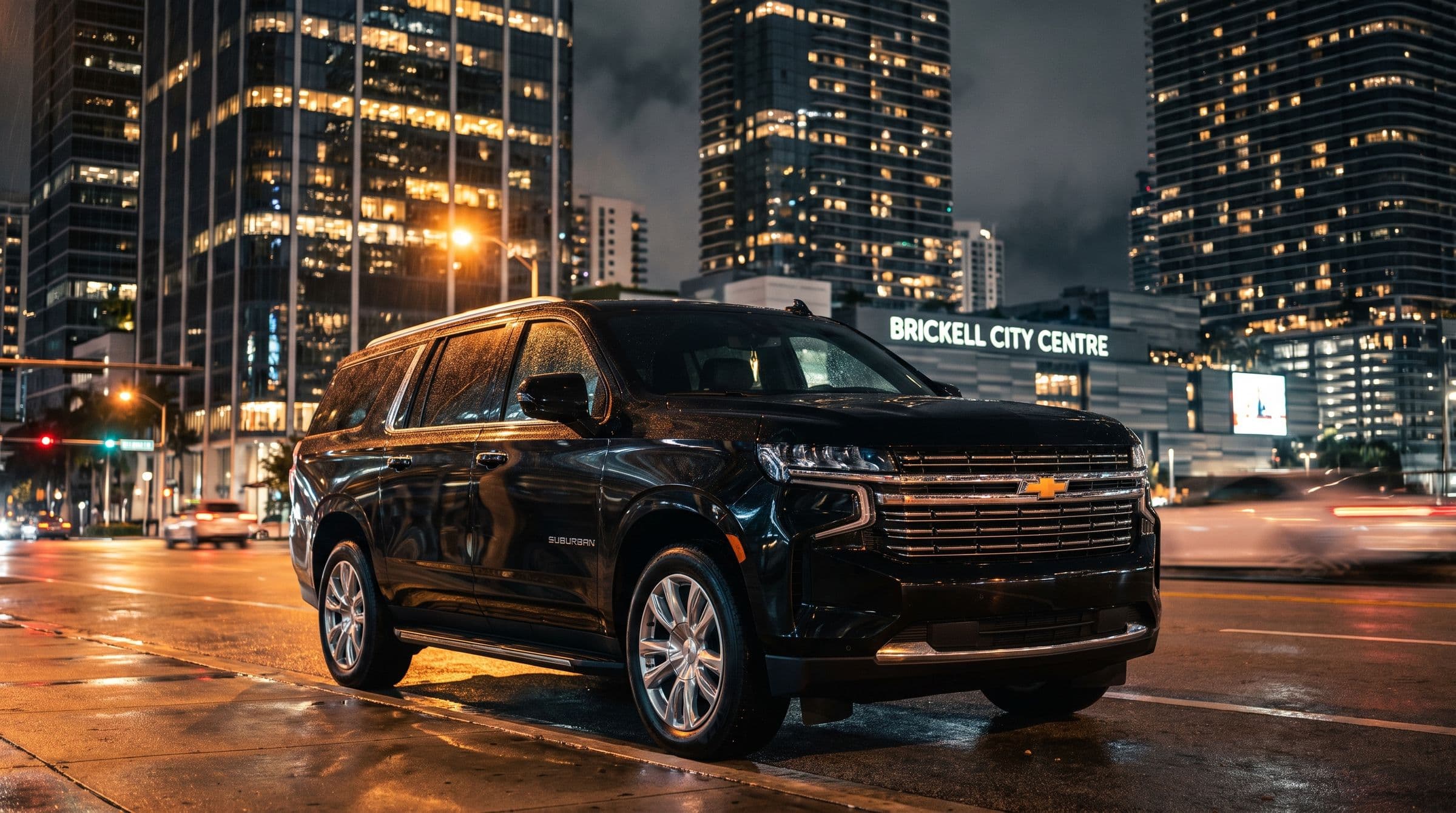 Black Chevrolet Suburban at night on Brickell Avenue, Miami