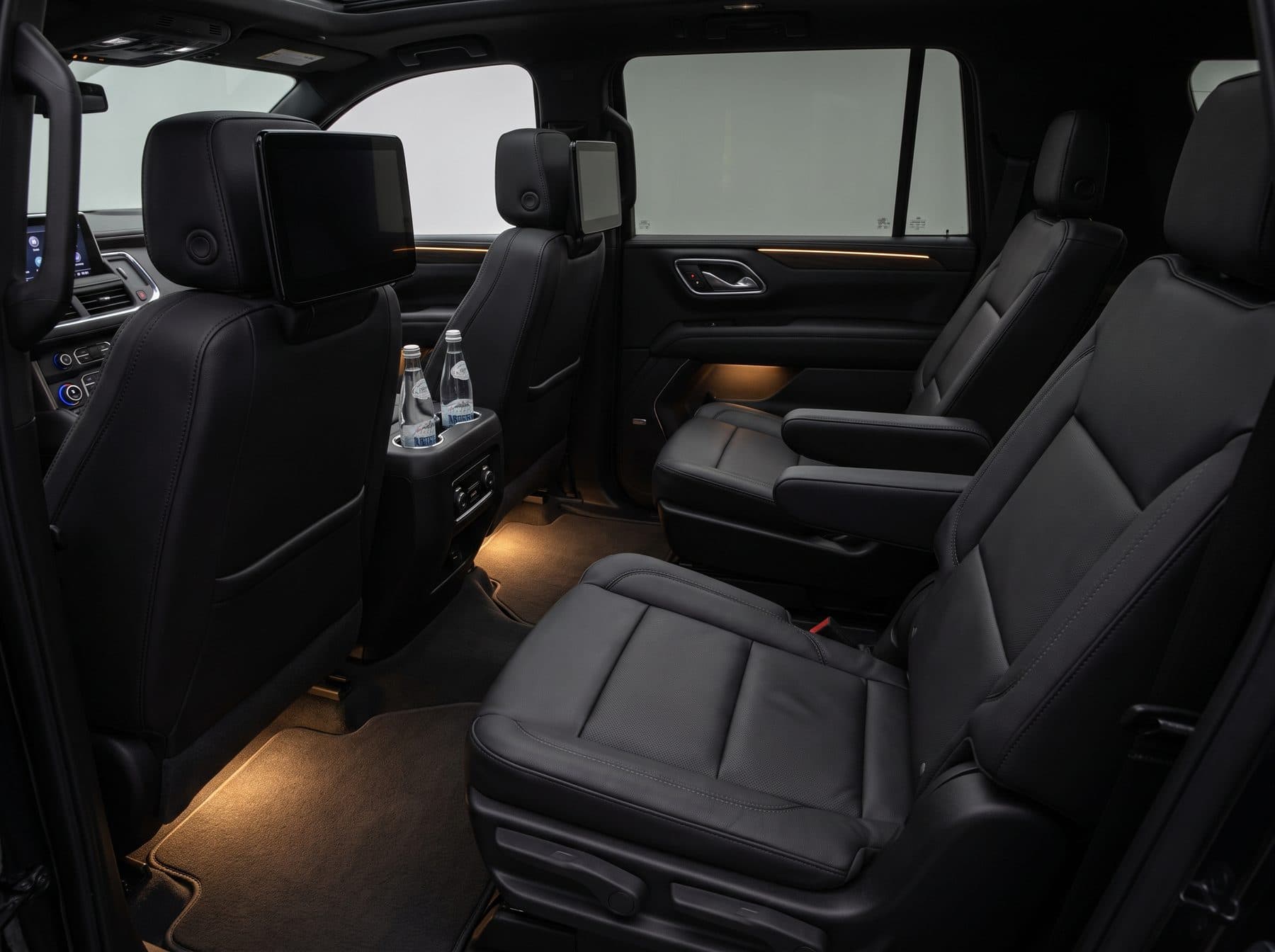 Interior of the 2022 Chevrolet Suburban, leather captain's chairs and cabin detail
